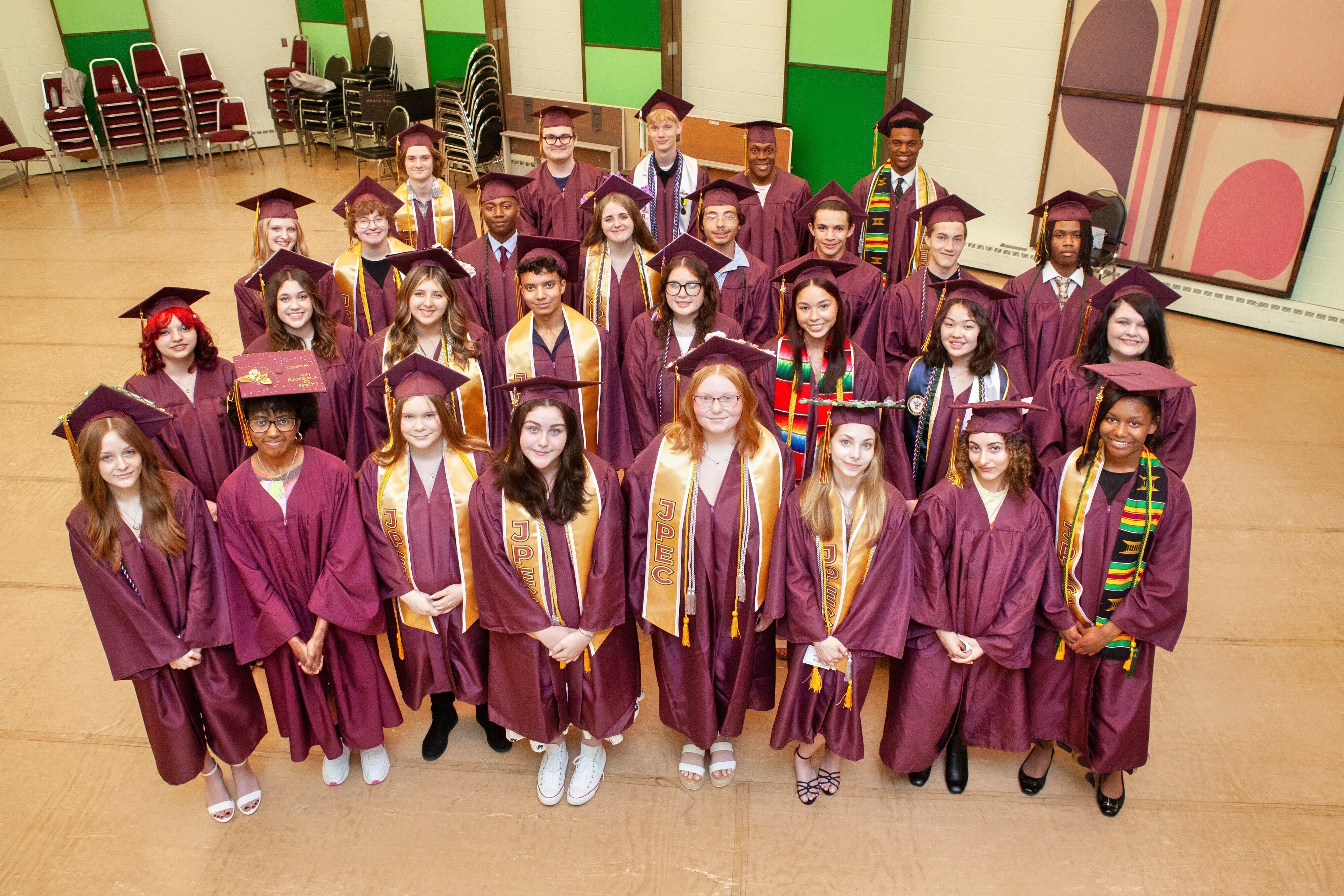 The Jackson Preparatory & Early College graduating class poses together in their caps and gowns.