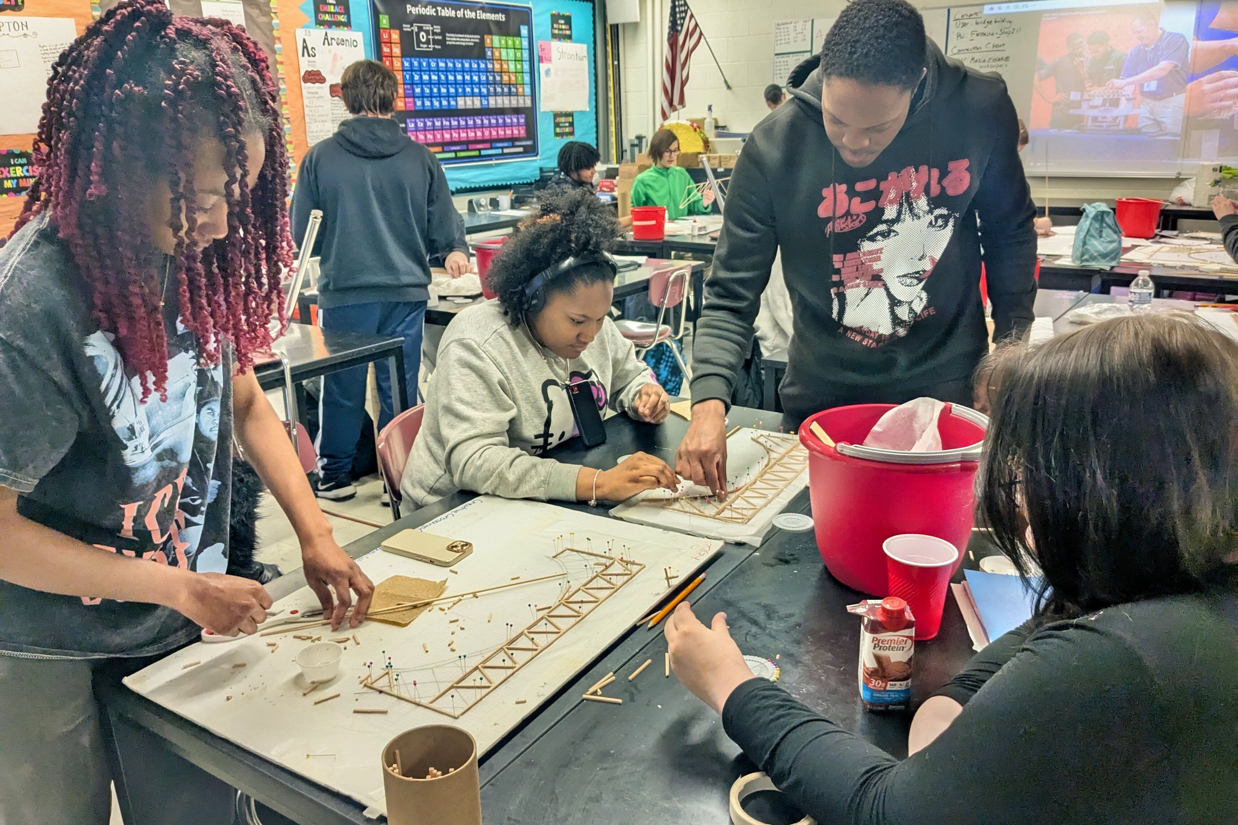 Jackson Preparatory & Early College high school students work together on a bridge building project.
